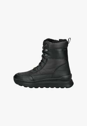 Zwarte enkellaarzen met een gewatteerde nylon bovenkant, leren accenten, een faux fur voering en een gestructureerde rubberen zool met een ondersteunende buitenzool.