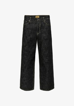 Zwarte wijd uitlopende jeans van denim, voorzien van gele stiknaden, voorkantzakken, een knoopsluiting en een merkembleem bij de tailleband.