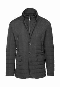 Giacca nera trapuntata con colletto alto, zip frontale, due tasche laterali e chiusura a bottoni. Materiale leggero, texture liscia.