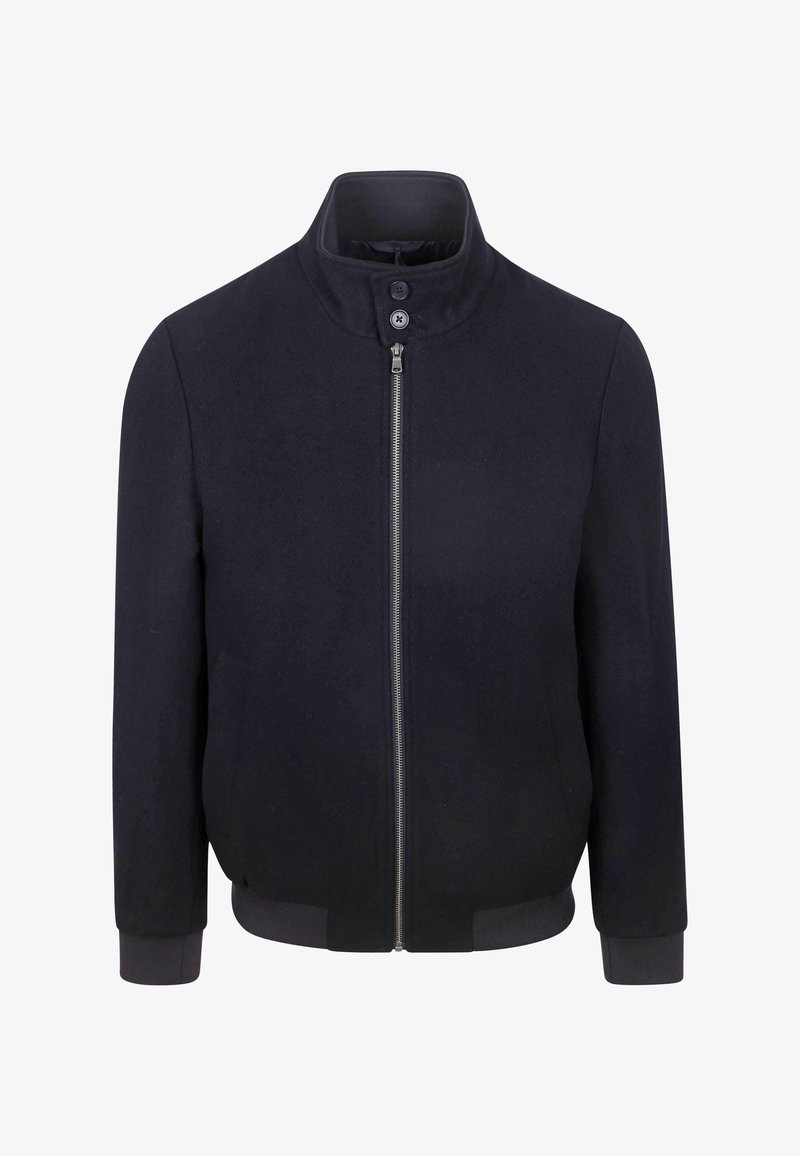 Navy zip-up jacket with high collar, two buttons at the neck, ribbed cuffs, and waistband. Fabric has a textured surface.