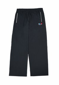 Pantalon décontracté noir avec ceinture élastique, poches latérales bordées de blanc, et petit logo rouge, bleu et blanc sur la hanche droite.