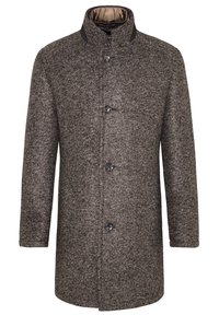 Cappotto di lana marrone con una finitura strutturata, dotato di colletto alto, sei bottoni e due tasche laterali. L'interno è foderato con un tessuto beige.