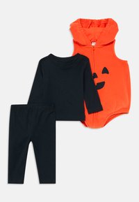 Toddler outfit set with black long-sleeve shirt and pants, plus orange sleeveless hoodie with jack-o'-lantern face and zipper front.