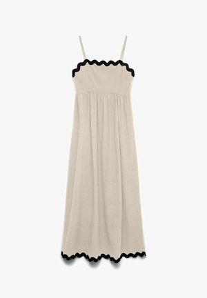 Beige ermeløs midikjole med tynne stropper og svart bølget pynt langs utringningen og kanten.