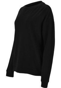 Zwarte sweatshirt van zachte stof, met een ronde hals, lange mouwen en ribgebreide manchetten en zoom, in een ontspannen pasvorm.