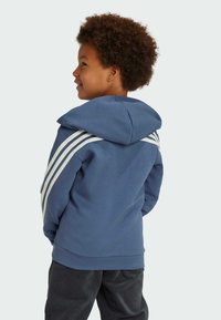 adidas Sportswear DISNEY MICKEY MOUSE - Felpa con zip - preloved ink   off white