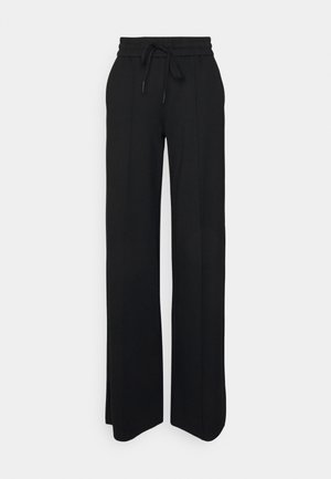 Pantalon noir à jambes larges avec une taille haute élastique et un cordon à nouer à l'avant, présenté sur un fond clair uni.
