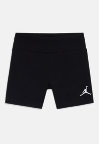 Čierne športové šortky vyrobené z mäkkej tkaniny s elastickým pásom. Na dolnej ľavej nohe sa nachádza biele logo Jumpman.