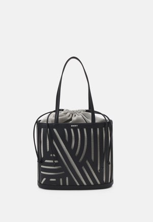 Black canvas bag with a drawstring closure and two handles. Design features geometric patterns in contrasting gray. Soft texture, structured shape.