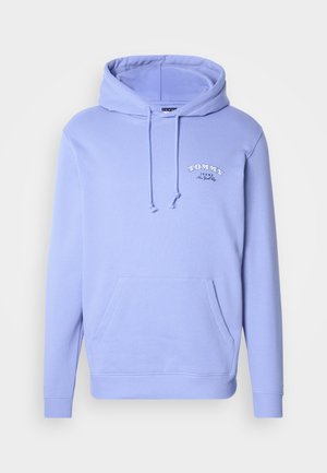 Felpa con cappuccio lilla chiaro realizzata in tessuto morbido, con tasca frontale, coulisse sul cappuccio e logo "Tommy Jeans" ricamato.