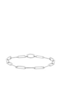 Sølv kædedesign med forlængede led, en central cirkulær detalje, poleret finish og minimalistisk stil.