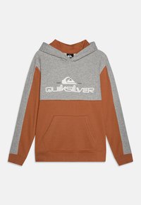Felpa con cappuccio caratterizzata da un corpo grigio con dettagli marroni, grande tasca frontale e logo bianco "Quiksilver" sul petto.