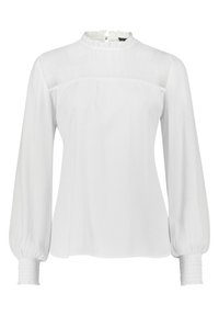 Blouse blanche à manches longues avec col montant à volants, empiècement épaule transparent, poitrine froncée, manches bouffantes et poignets smockés.