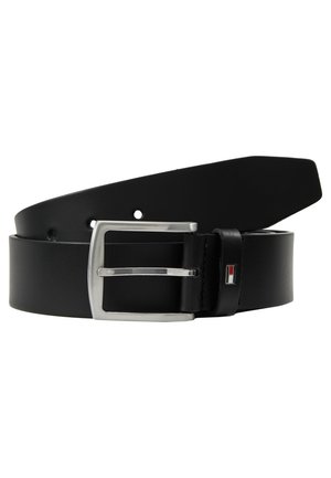 Black leather belt with silver rectangular buckle and small red, white, and blue rectangular logo on the loop, rolled with tip extended.