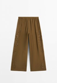 Brown wide-leg pants with elastic waistband and subtle floral embroidery along the sides against a white background.