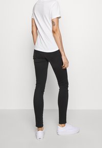 Diesel Vaqueros pitillo - black denim