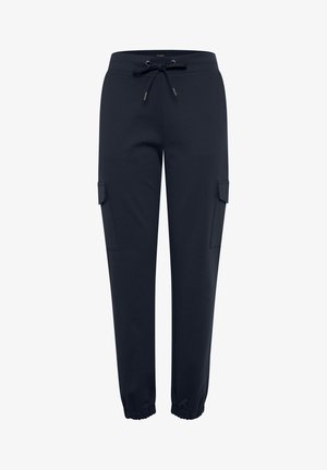 Navy sweatpants made of soft fabric, featuring an elastic waistband with drawstring, two side pockets, and tapered cuffs.