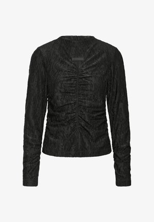 Crna majica s dugim rukavima od teksturirane tkanine, s naborima sprijeda i okruglim izrezom. Suptilni sjaj isprepletenih vlakana.