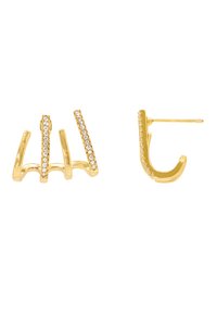 Boucles d'oreilles en or avec un design à trois pointes, ornées d'accents en rhinestones transparents, et un style de crochet lisse et courbé de l'autre côté.