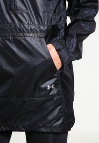 Under Armour Regnjacka - black