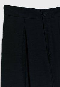 Stradivarius Broek - black