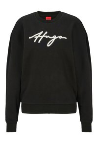 Schwarzer Hoodie aus Baumwolle mit Rundhalsausschnitt, langen Ärmeln und einem weißen, kursiven "Hugo"-Logo, das auf der Vorderseite gestickt ist.