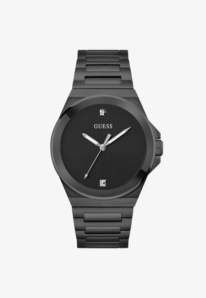 Montre en acier inoxydable noir avec un cadran rond, un design minimaliste, trois aiguilles et deux marqueurs en diamant. Équipée d'un bracelet à maillons.