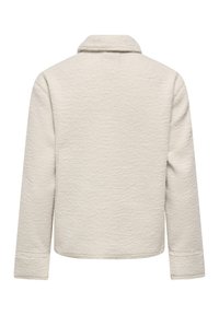 Kremfarget, langermet, strukturert jakke med kort, bred krage vist bakfra på hvit bakgrunn.