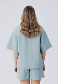 Laurella NAOMA SET - Kratke hlače - light blue