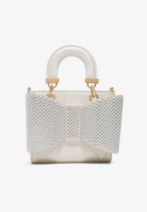 Small white handbag with padded handle and large front bow adorned with silver beads and gold hardware accents.