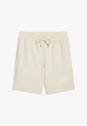 Beiga shorts i mjukt tyg, med justerbart snöre i midjan, sidofickor och en tryckt logotyp på vänster ben.