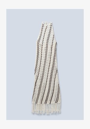 Crochet dress in white with brown stripes, featuring a sleeveless design and fringed hem. Made of lightweight yarn.