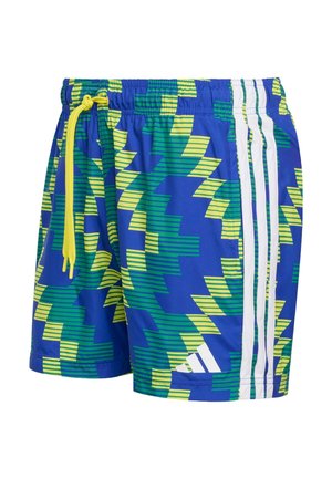 Niebieskie spodenki kąpielowe z geometrycznym wzorem w zielonym i żółtym kolorze. Posiadają elastyczną talię z żółtym sznurkiem oraz trzy białe paski.