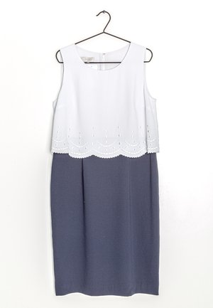 Ärmelloses Kleid mit einem weißen Oberteil mit gewelltem Spitzenbesatz und einem marineblauen Rock, gefertigt aus glattem Stoff mit einem entspannten Schnitt.