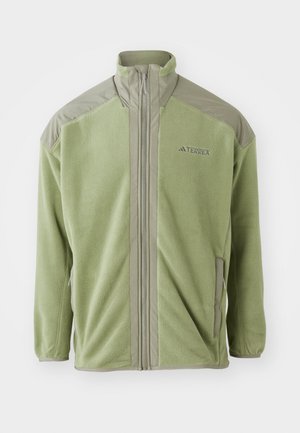Grüner Fleece-Jacke mit hohen Kragen und Reißverschlüssen. Verfügt über kontrastierendes Material an den Schultern, zwei Seitentaschen und das "Terrex"-Logo.