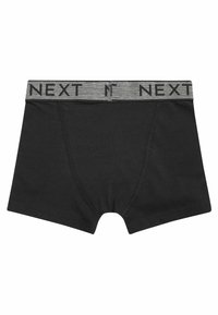 Melni bokseršortai ar pelēku elastīgu jostasvīru, uz kura ir "NEXT" logo. Gluda auduma, pieguļoša dizaina un tradicionāls noapaļots apakšmalas stils.