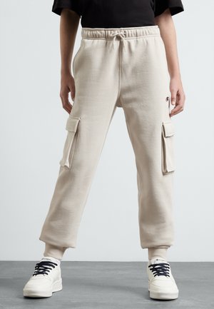 Champion ICONS CUFF PANTS - Tracksuit bottoms - off-white