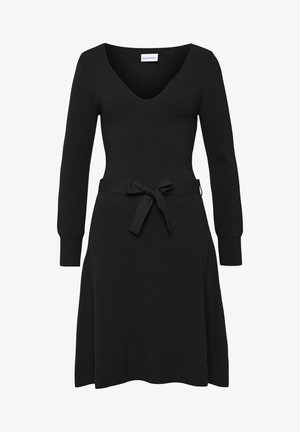 Schwarzes Strickkleid mit langen Ärmeln, V-Ausschnitt und tailliertem Schnitt. Verfügt über einen Bindegürtel und einen auslaufenden Rock. Glatte Textur über das gesamte Kleid.