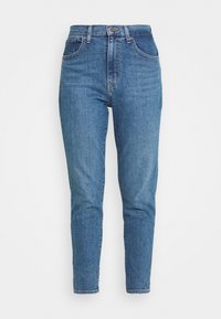 Blåa jeans med hög midja i medium tvätt, tillverkade av denim, med fem fickor och rak benmodell. Diskret whiskering-detalj.
