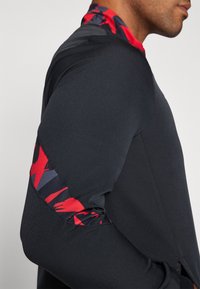 Castore FEYENOORD ROTTERDAM LEAGUE MATCHDAY ANTHEM JACKET - Klub merchandise - caviar/tomato