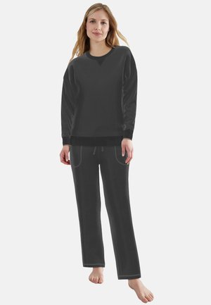 Schwarzes Sweatshirt- und Hosen-Set mit langen Ärmeln und Kordelzugbund. Verfügt über kontrastierende Nähte und ein lässiges Design.