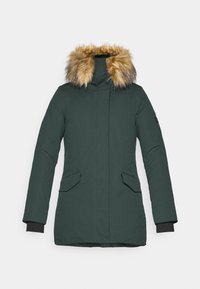 Parka vert foncé avec un doublure en fausse fourrure. Elle dispose d'une fermeture éclair, de deux poches avant et de poignets élastiques pour plus de chaleur.