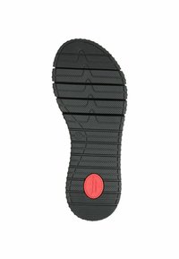 Zwarte rubberen schoenzool met een gestructureerd patroon en horizontale groeven, met een rode cirkelaccent gemarkeerd met "Comfort."