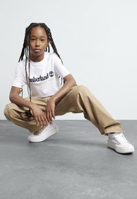 Timberland SHORT SLEEVES TEE - Print T-shirt - white