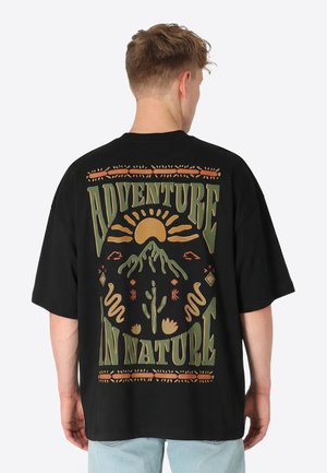 OVERSIZED GLOW - T-Shirt print - schwarz