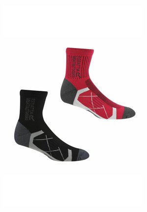 Pair of mid-length sports socks, one black with gray accents, one red with gray and white details, both with a brand logo on the cuff.