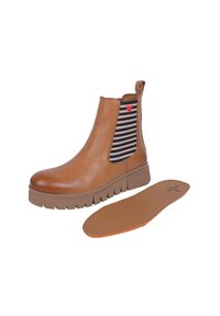 Bottine en cuir tan avec un côté élastique rayé noir et blanc, détail en forme de cœur rouge, et une semelle en caoutchouc texturée épaisse. Semelle intérieure amovible visible.