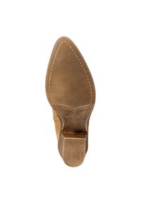 Beige højhælet skosål med spids tå, struktureret gummigreb, syningsdetaljer og størrelse markeret som 37.