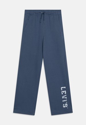 Mørkeblå joggebukser med elastisk liv, snøring, sidelommer og "LEVI'S" logo i hvitt på venstre ben.