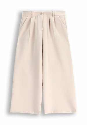 - Spodnie materiałowe